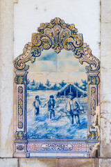 Portuguese Azulejos depicting typical regional scenes and monument on the facade of Santarem...