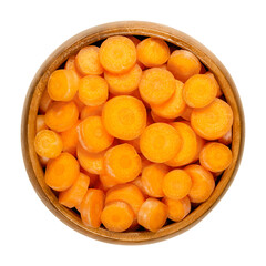 Small carrot slices in wooden bowl. Crunchy and fresh, unpeeled, small and young carrots, cut into round discs, ready-to-eat and as a snack. Close-up from above, over white, isolated macro food photo.