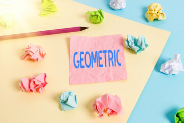 Conceptual hand writing showing Geometric. Concept meaning using straight or curved lines in designs and many more. Colored crumpled papers empty reminder blue yellow clothespin