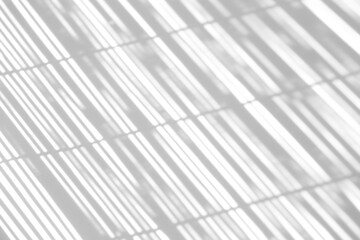 Shadow overlay effect for photo. Shadows from blinds, a window and a thin screen on a clean white wall in a sunny bright weather.