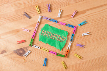 Conceptual hand writing showing Partnership. Concept meaning legal relation between two or more...