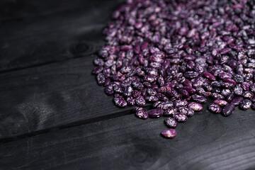 Beans is on a wooden background
