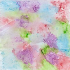 Colorful watercolor painting with splashes of red, purple, blue, green