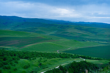 Mountains and plains stretching over the horizon