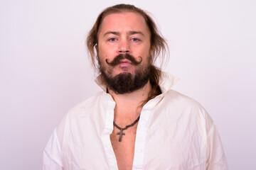 Bearded man with mustache and long hair against white background