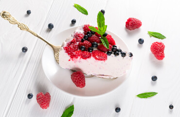 Slice Of New York Cheesecake With A Sprig Of Mint