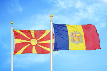 North Macedonia and Andorra two flags on flagpoles and blue sky