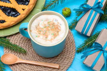 Refreshing coffee with new year's gifts and delicious berry pie.