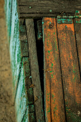 wooden boards with peeling paint, aged ragged background for design