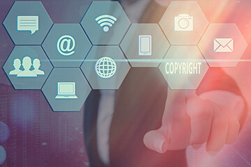Text sign showing Copyright. Business photo showcasing exclusive legal right to reproduce, publish,...