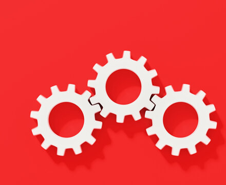 Three white connecting gear cogs in motion blur isolated on red background; flat lay, close up, top view 3d rendering, 3d illustration