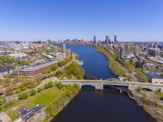 Fototapeta na wymiar Aerial view of Cambridge on the left and Boston on the right connected by Harvard Bridge from Charles River, Boston, Massachusetts MA, USA. 