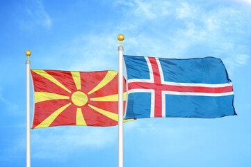 North Macedonia and Iceland two flags on flagpoles and blue sky
