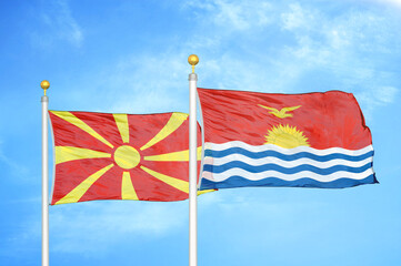 North Macedonia and Kiribati two flags on flagpoles and blue sky