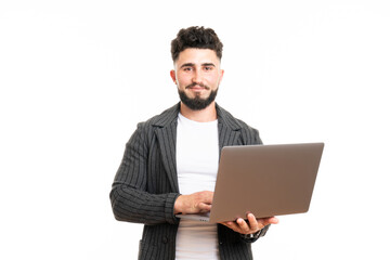 Pleasant positive business man using laptop, isolated over white background