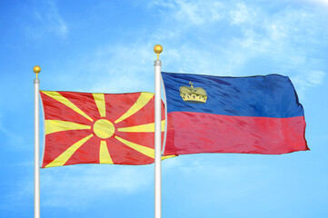 North Macedonia and Liechtenstein two flags on flagpoles and blue sky