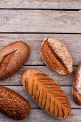Bread on rustic wooden background. Healthy gluten-free bread, top view. Food concept.