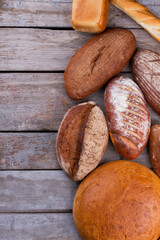 Assortment of organic bread in the shop. Assorted artisan bread at bread store.
