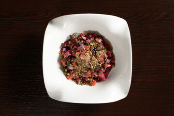 Delicious and healthy vegetable salad vinaigrette, top view. Photos for restaurant and cafe menus