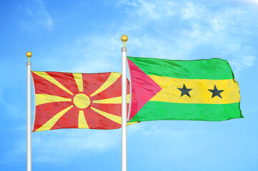 North Macedonia and Sao Tome and Principe two flags on flagpoles and blue sky
