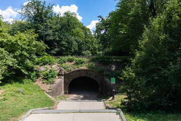 Stairs going Down to a Tunnel and Bridge at Central Park during Summer in New York City