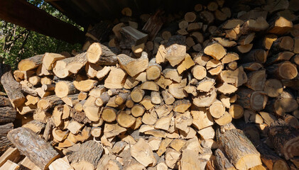 A pile with firewood prepared for kindling a stove or for a fire   