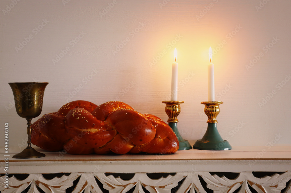 Wall mural shabbat image. challah bread, shabbat wine and candles