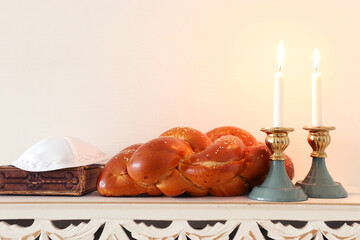 shabbat image. challah bread, shabbat wine and candles
