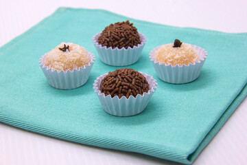 Traditional Brazilian sweet, brigadeiro and beijinho.