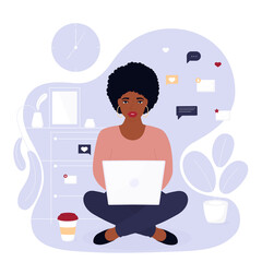 African American woman freelancer working on laptop at home in quarantine. Girl chatting on social media