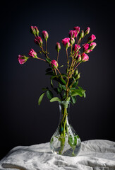 Red roses flowers in vase.