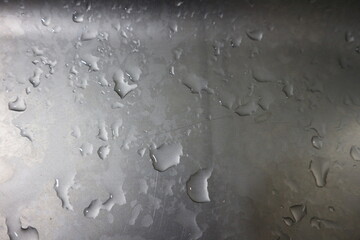 Water droplets on the bathroom mirror