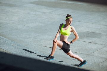 Motivation. Female runner, athlete training outdoors. Professional runner, jogger working out on...