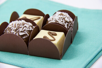 Variety of bonbons, chocolate and coconut and white chocalate.