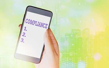 Writing note showing Compliance. Business concept for ability of an object to yield elastically...