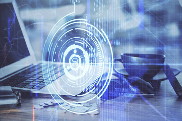 Double exposure of computer and technology theme hologram. Concept of freelance work.
