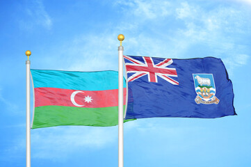 Azerbaijan and Falkland Islands two flags on flagpoles and blue sky