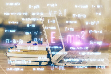 Desktop computer background and formula hologram writing. Double exposure. Education concept.