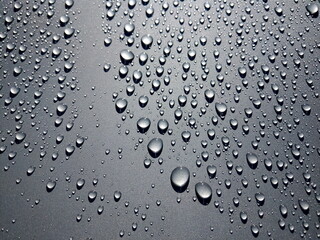 some raindrops on a surface as background