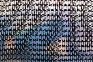 Close-up detail of the knots of a fine-mesh nylon mesh.