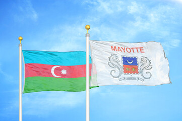 Azerbaijan and Mayotte two flags on flagpoles and blue sky