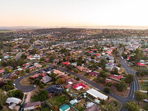 Aerial view of town houses during sunset