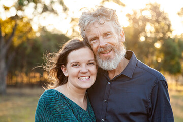 Portrait of father and smiling daughter together