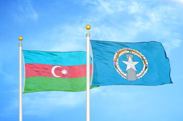 Azerbaijan and Northern Mariana Islands two flags on flagpoles and blue sky