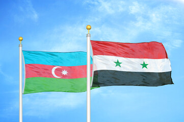 Azerbaijan and Syria two flags on flagpoles and blue sky