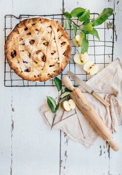 Home baked apple pie cooling on a rack
