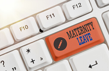 Writing note showing Maternity Leave. Business concept for a leave of absence for an expectant or a...
