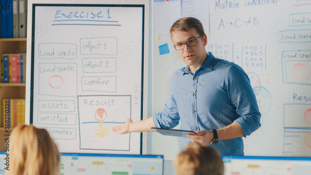 Poster elementary school class: teacher uses interactive digital whiteboard, explains lesson to diverse gro