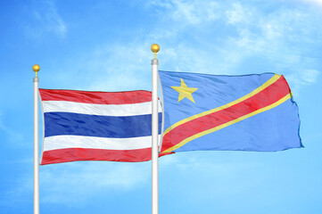 Thailand and Congo Democratic Republic two flags on flagpoles and blue sky