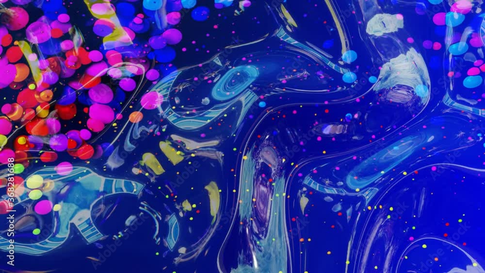 Poster abstract looped background of shiny glossy surface like wavy blue liquid with rainbow color circles 